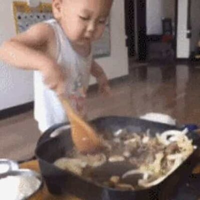 Little baby boy cooking stir-fry  Funny GIF